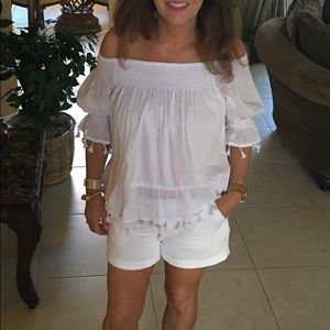 White off the shoulder top with tassels
