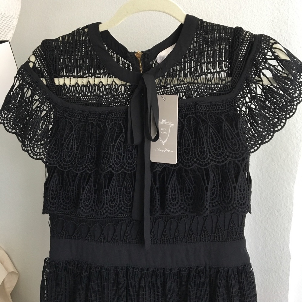 Never worn Stunning black detailed dresses