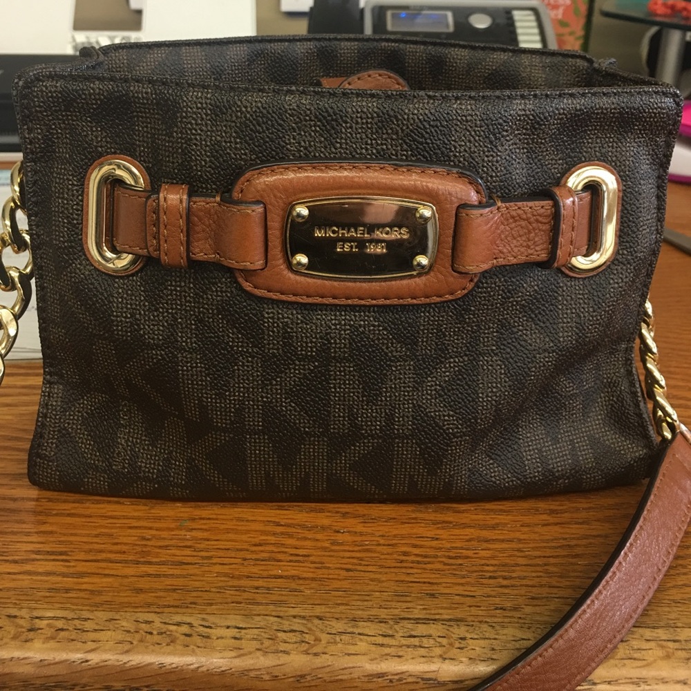 Black and brown Micheal Kors small cross body bag