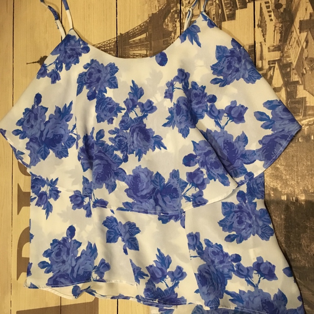 Blue and white top by paper crane