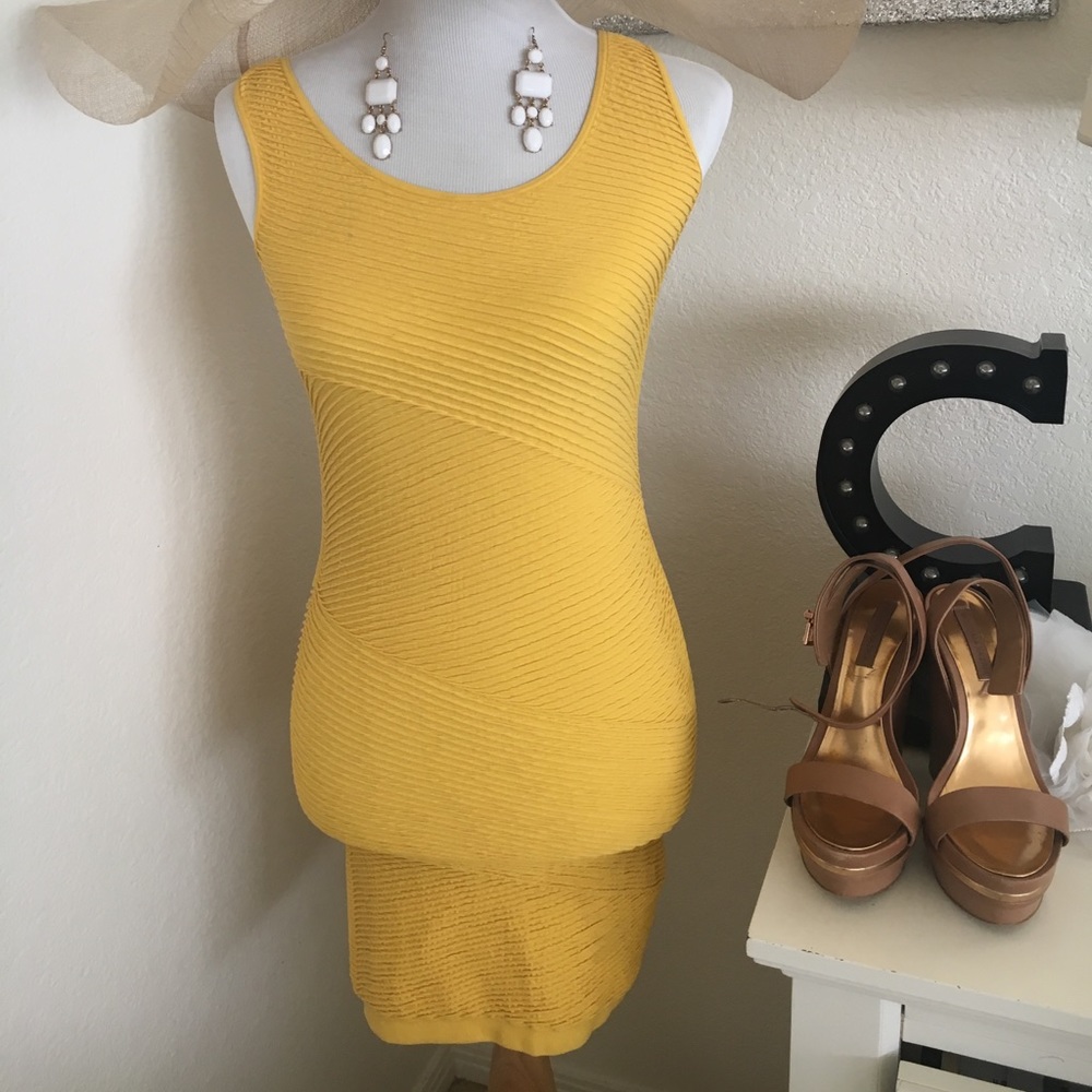 Yellow body con Bebe dress