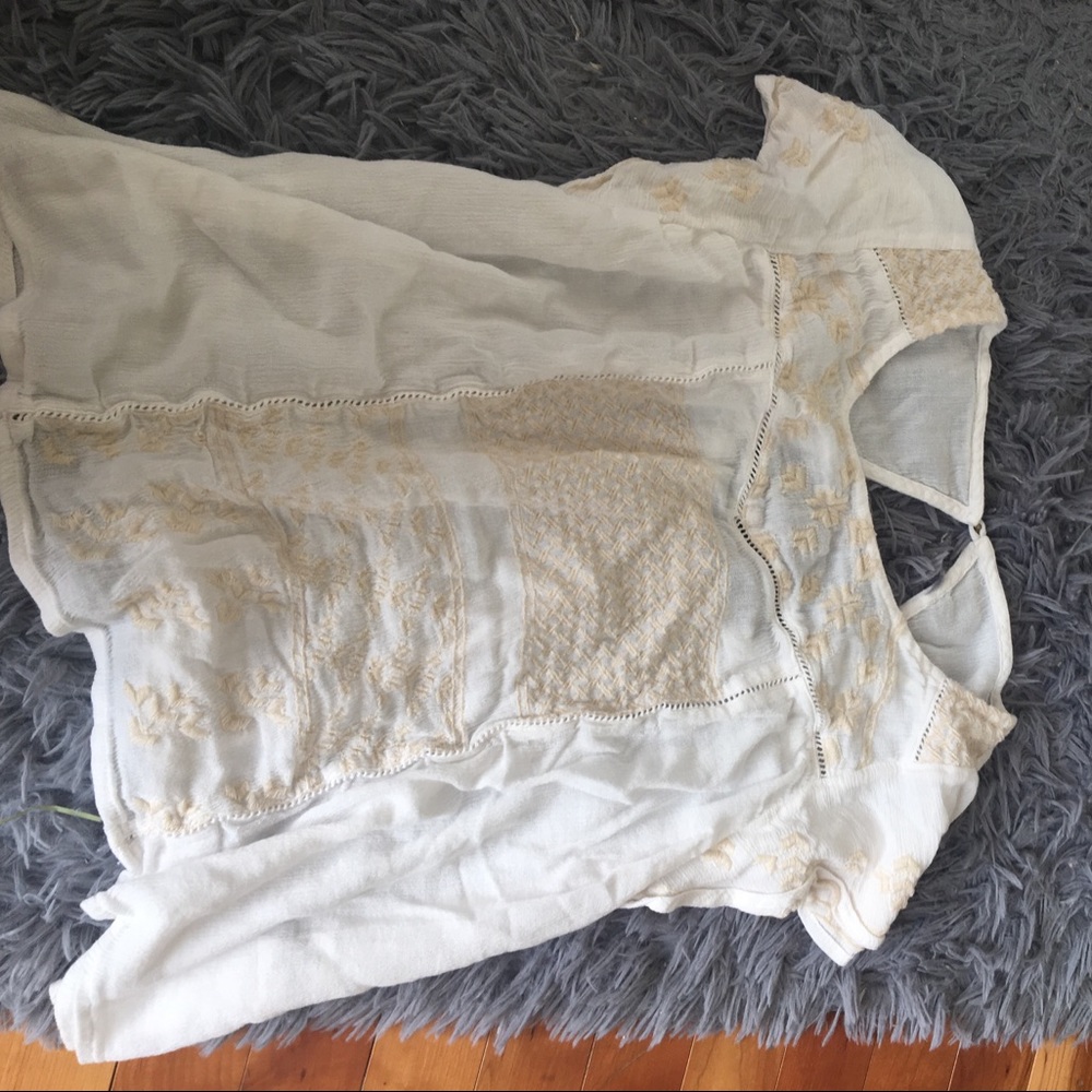 white top with detailing