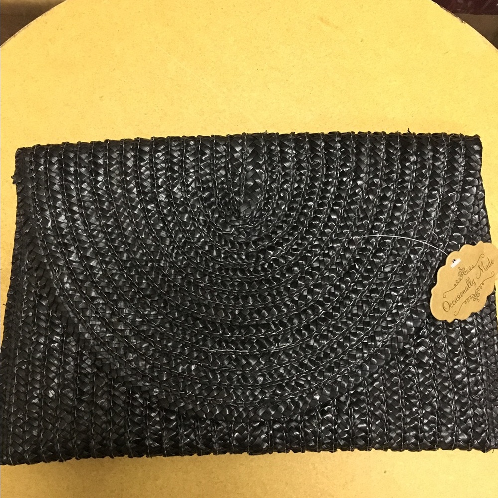 Black straw clutch