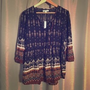 A must have dressy top!