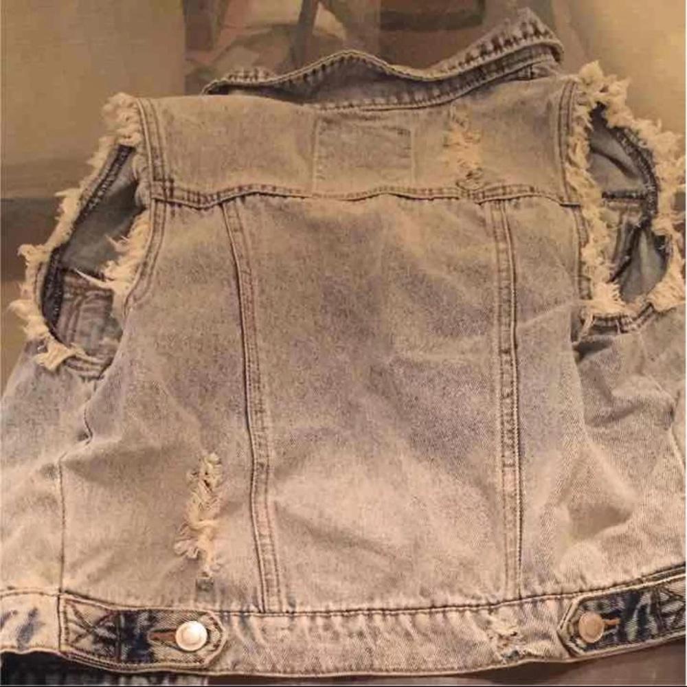 Ripped jean vest