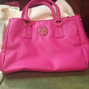 Fuchsia colored leather purse