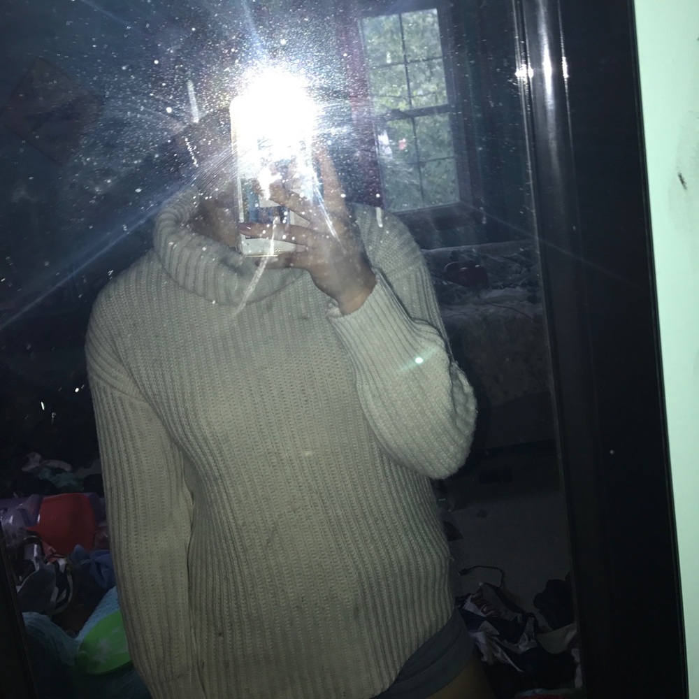 White turtleneck sweater