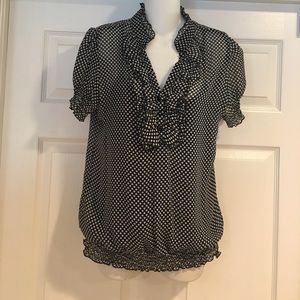 Maybe black & white polka dot blouse