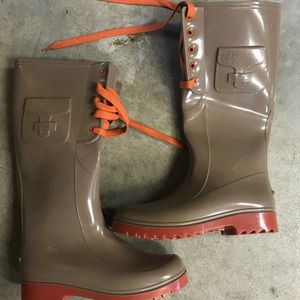 Unworn rain boots by the brand See by Chloe.