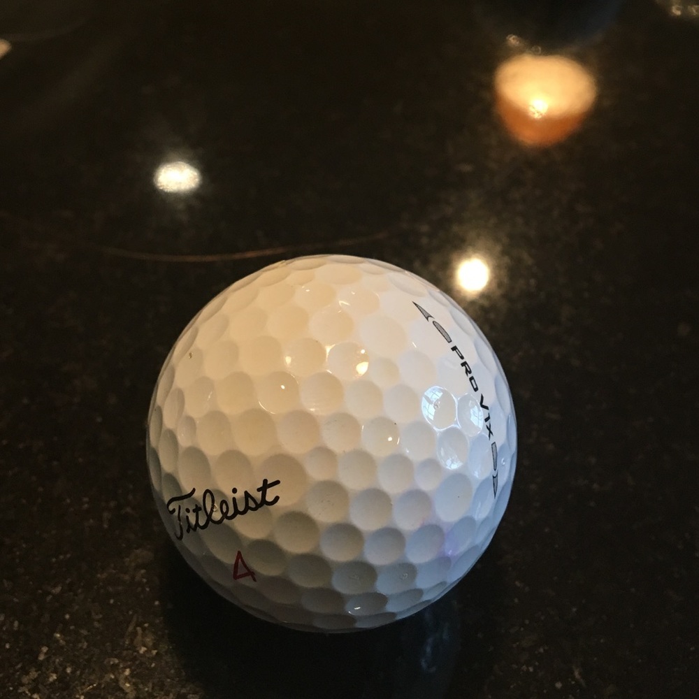 12 near mint Titleist pro v1x golf balls