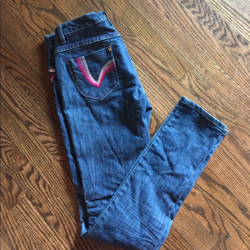 Skinny jeans with pink rhinestones