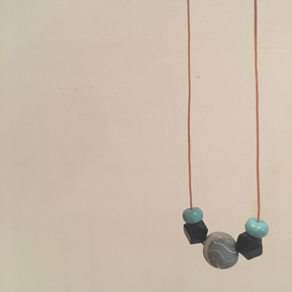 Symmetrical Geometric Necklace on Leather Cord