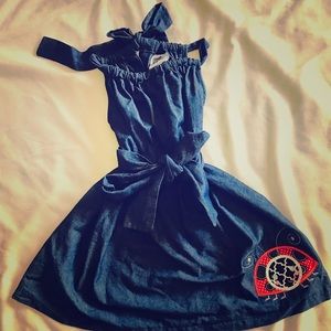 Girls blue jean dress with ladybug appliqué.