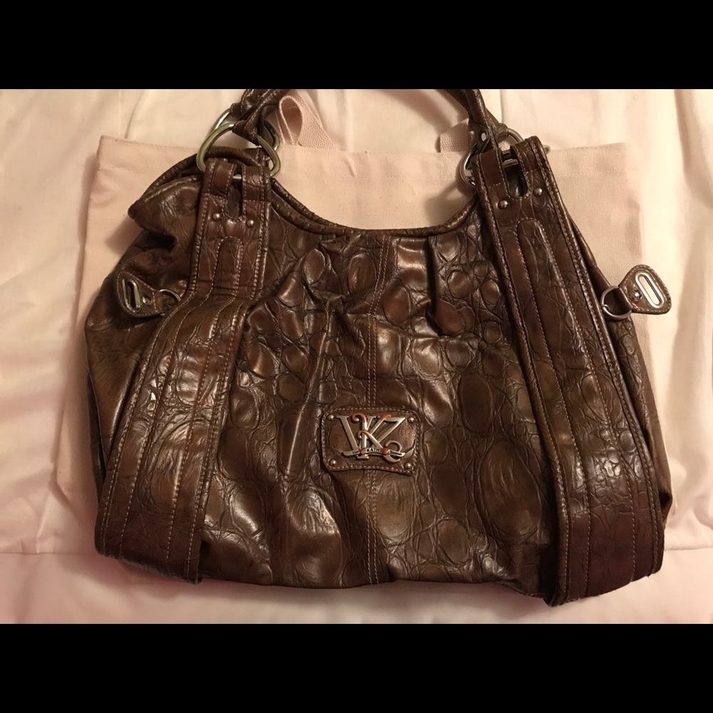 kathy van zeeland brown  snake print bag