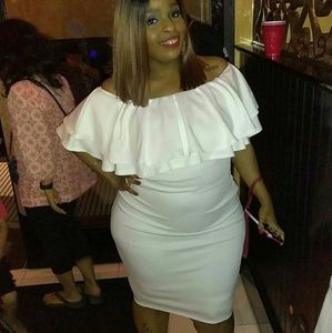 Off the shoulder ruffle dress.