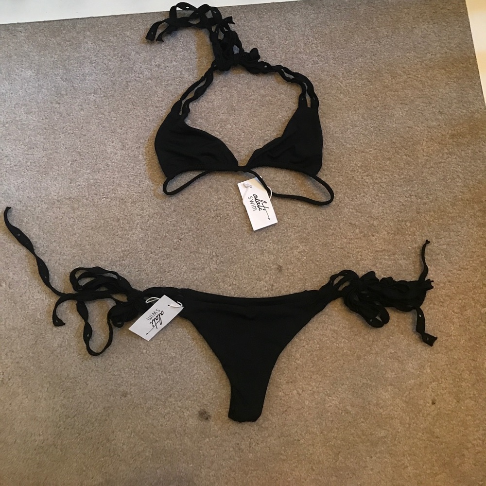 Black designer bikini from Bali, tags on