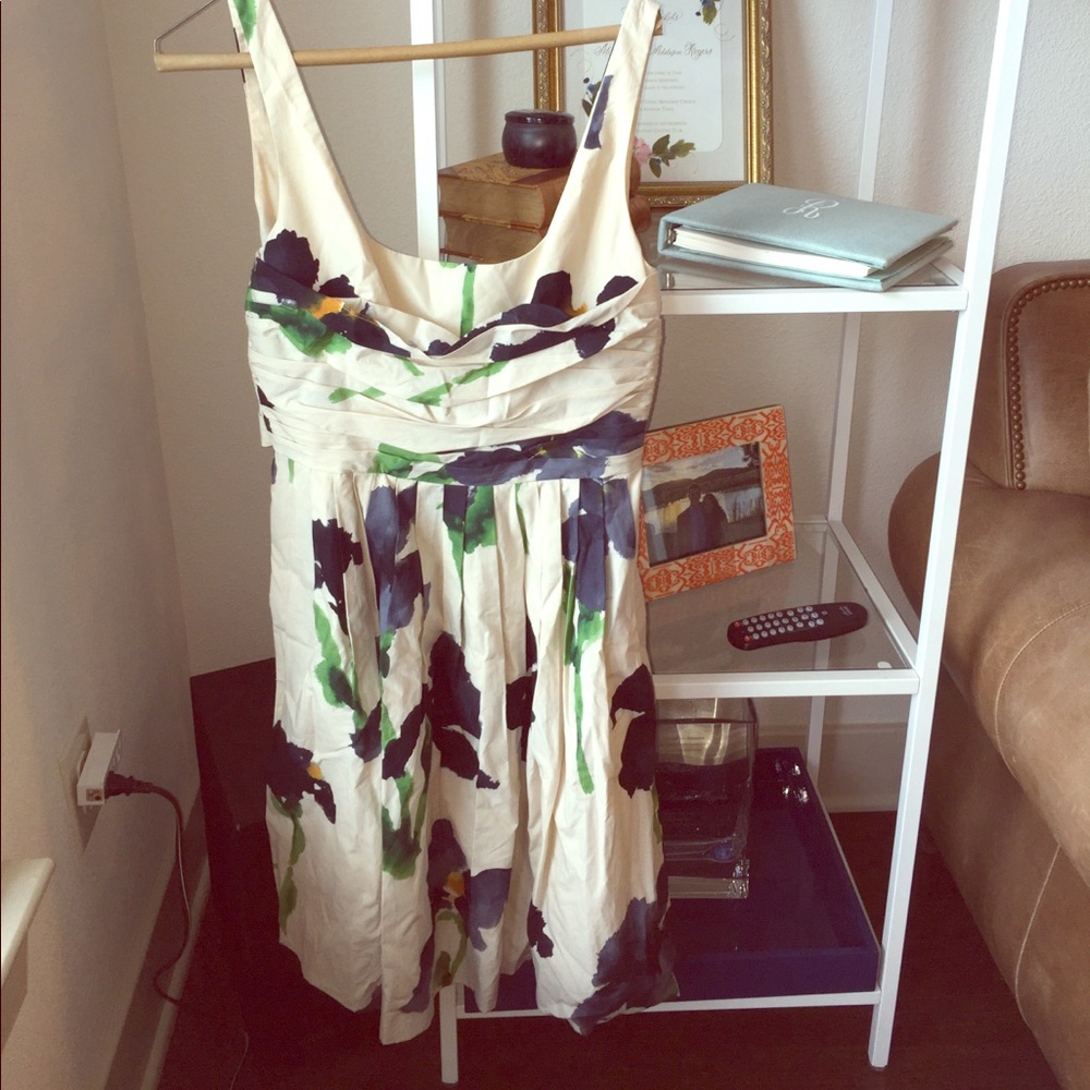 Dress. Love it! Back w/ bow, pockets, runs small.