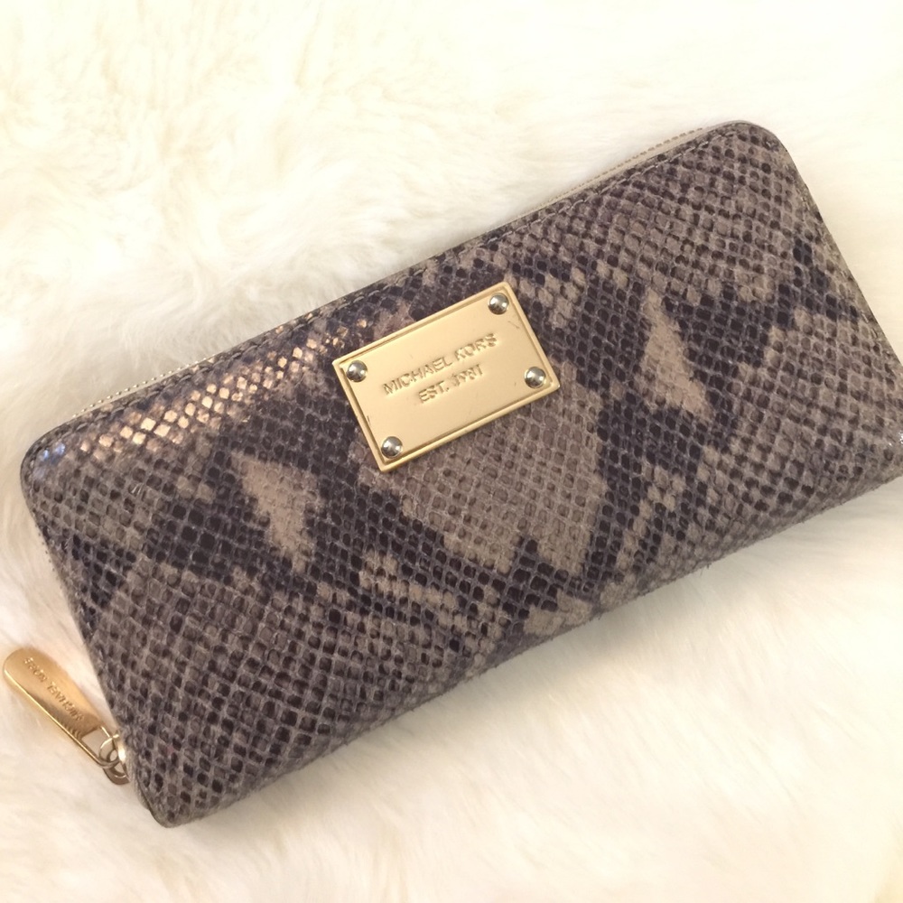 MK snake print wallet.
