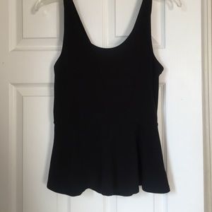 Black peplum express top