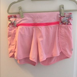 Pink Lululemon running shorts