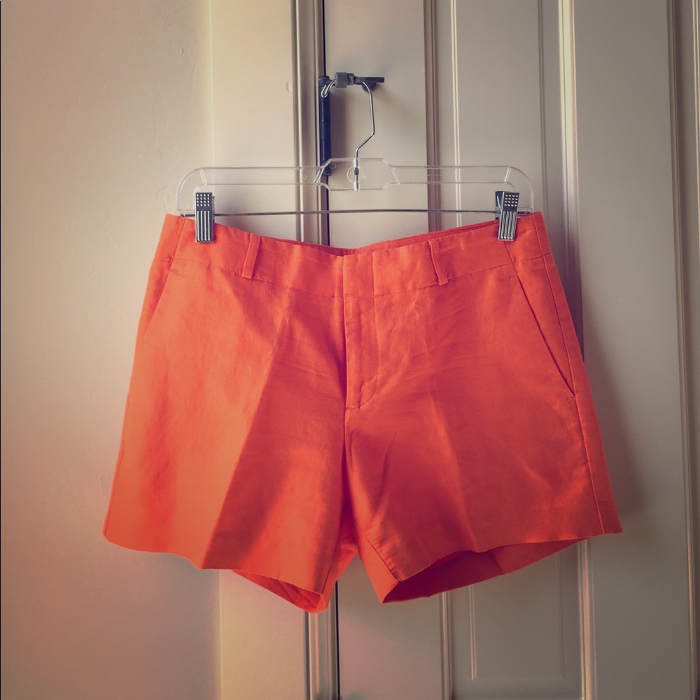 Orange shorts with cloth belt