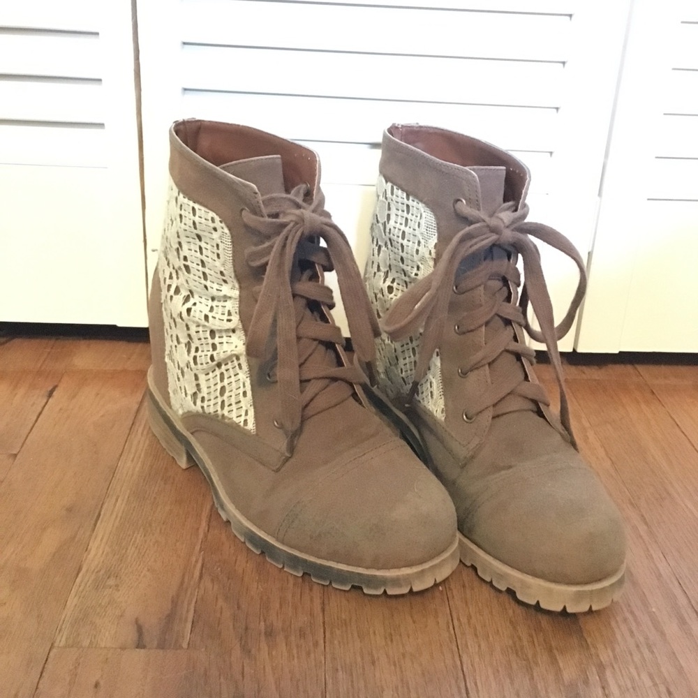 Tan and lace boots with a wedge