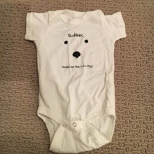 Quebec Canadian polar bear in a snowstorm onesie