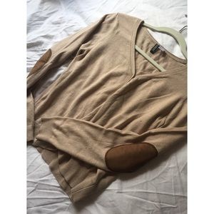 Lightly worn tan colored cardigan
