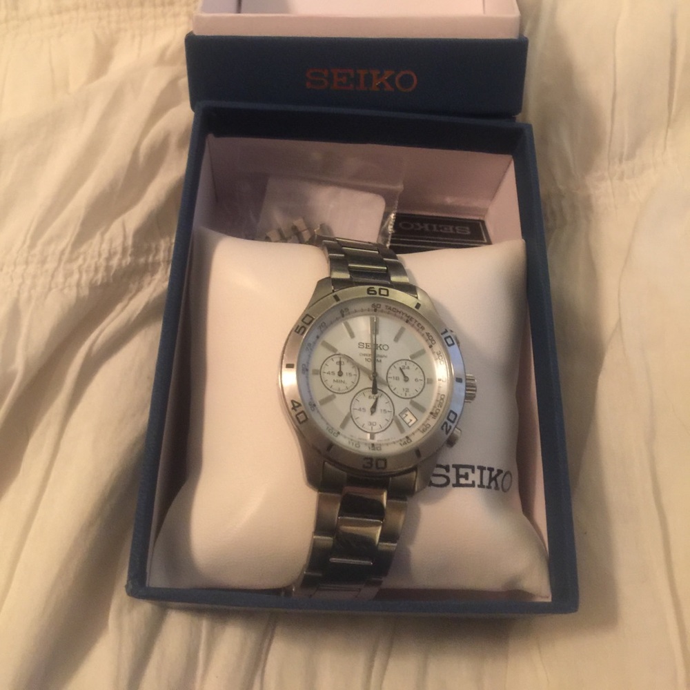 Silver seiko men's watch with extra links