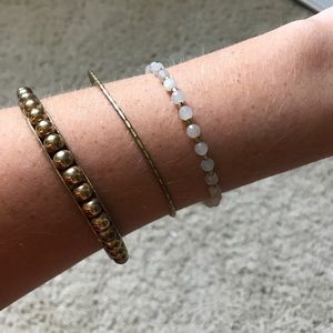 Gold bangle and lotus bracelet bundle