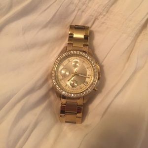 Gold and diamonds fossil watch