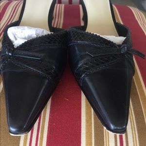 Black IMPO snakeskin slides