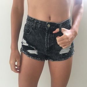 black distressed shorts
