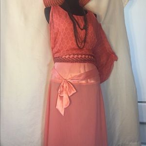 Peach skirt below knee.