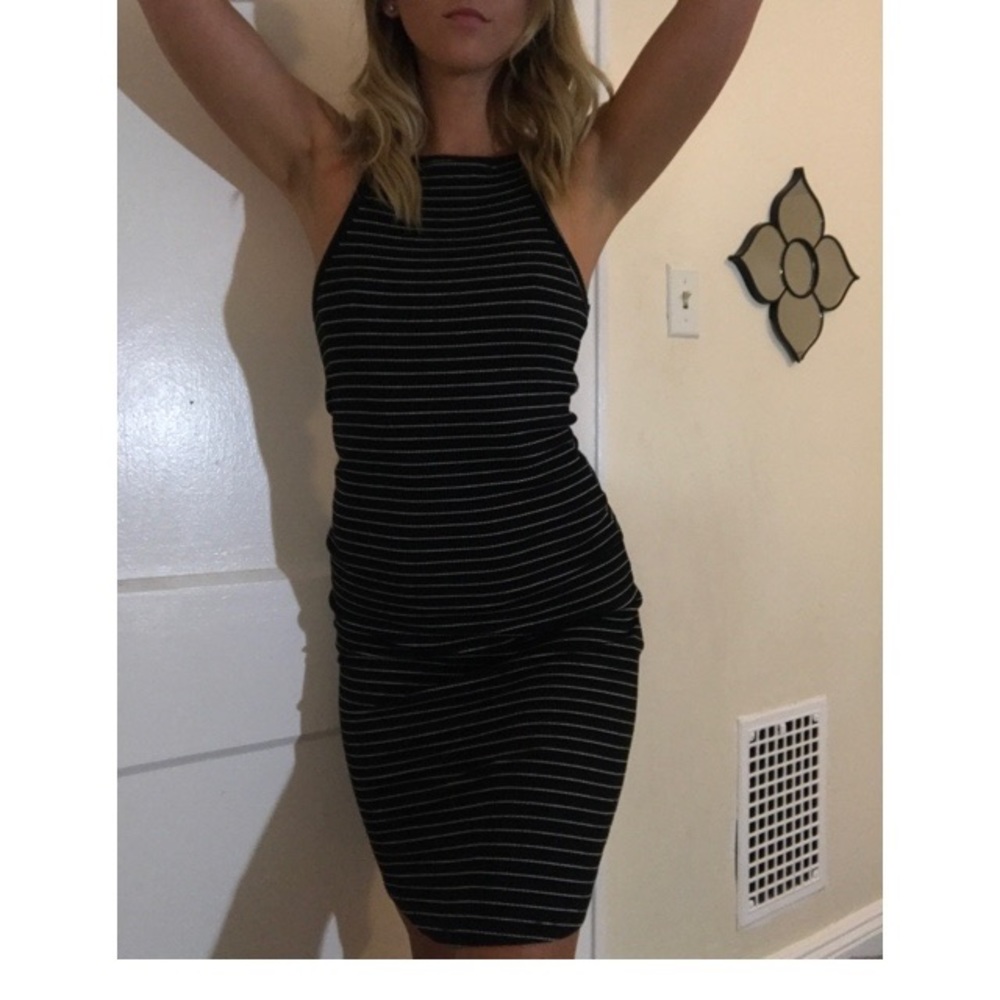 Mid-length cotton tank dress.