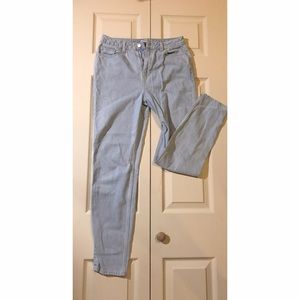 High-rise light denim jeans.