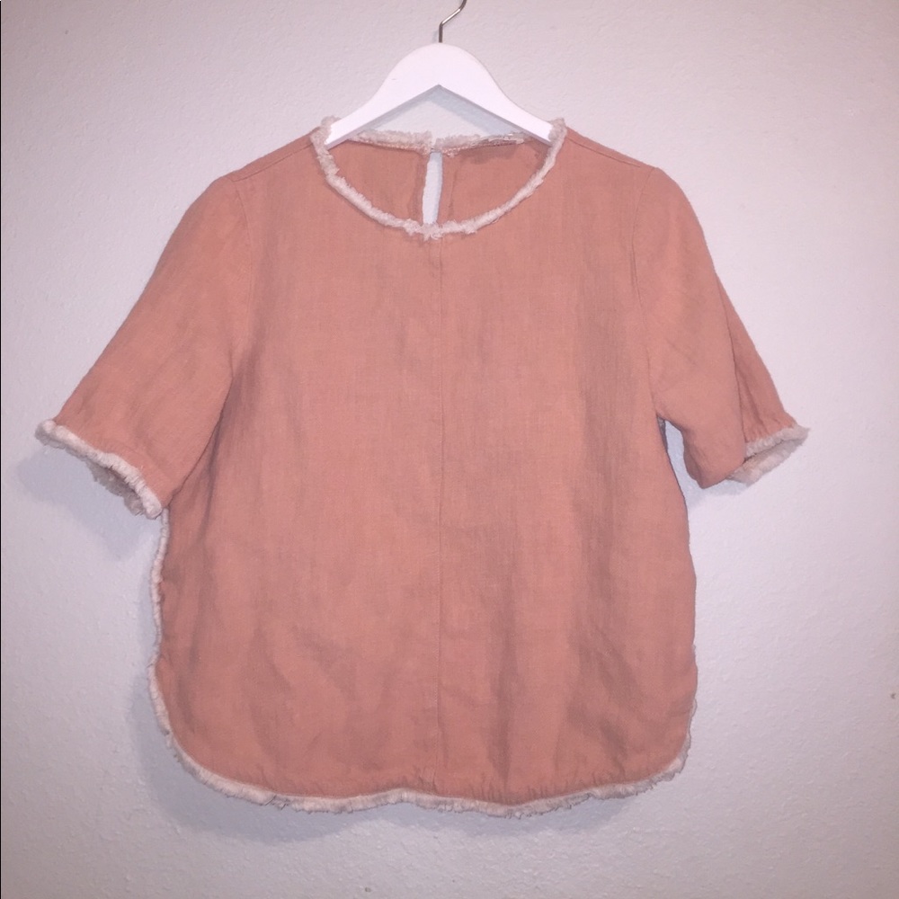 Distressed pink top