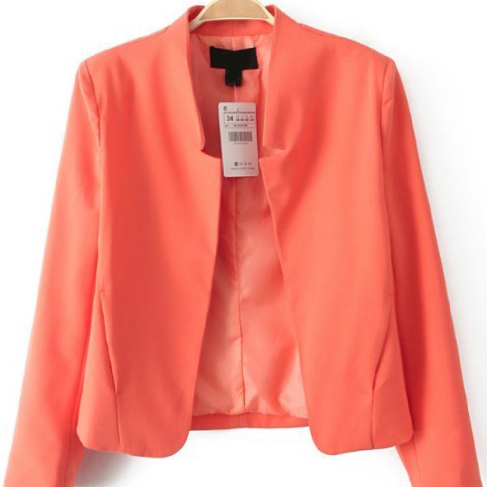 🔥🍊THIS ORANGE BLAZER  IS VERY CUTE🍊🔥