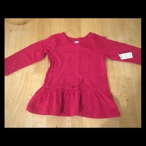 Long sleeve infants shirt.