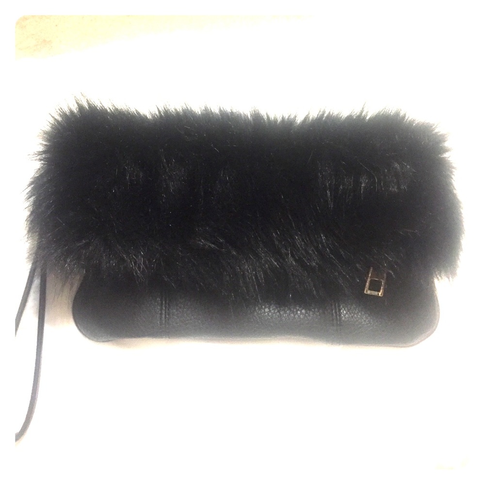 Carlos Santana brand furry clutch