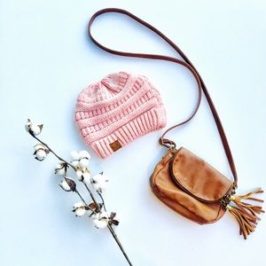 {c.c.} cable knit beanie