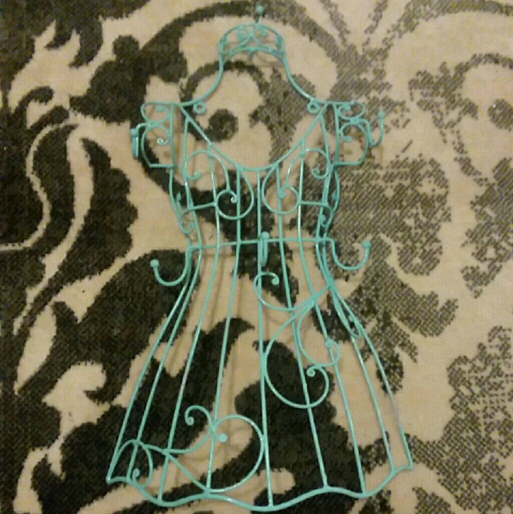 Turquoise wrought iron dress theme rack