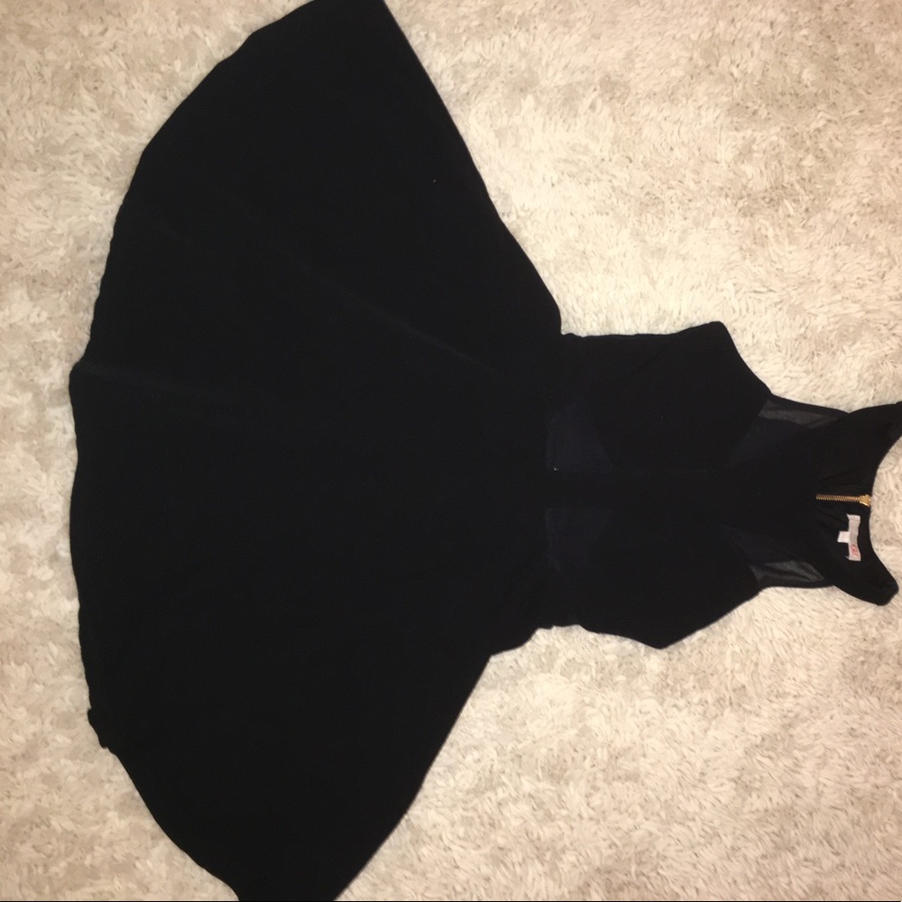 Black skater dress with gold zipper