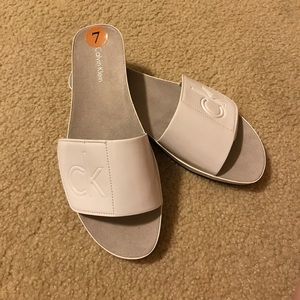 Calvin Klein white slide sandals