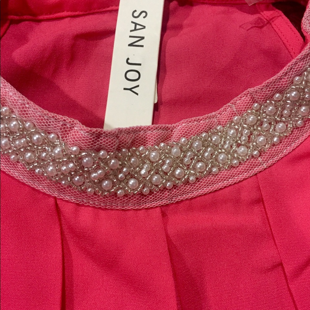Coral Top with a Beautiful Beaded Collar
