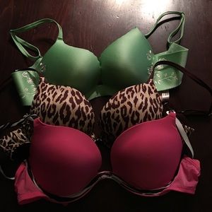 Three Victoria secret bras.