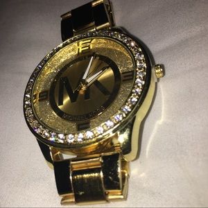Gold MK watch