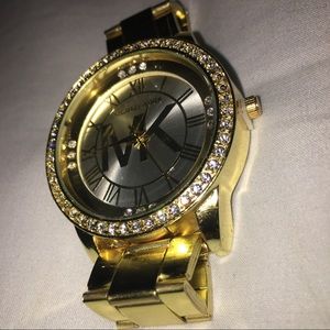 Gold MK watch