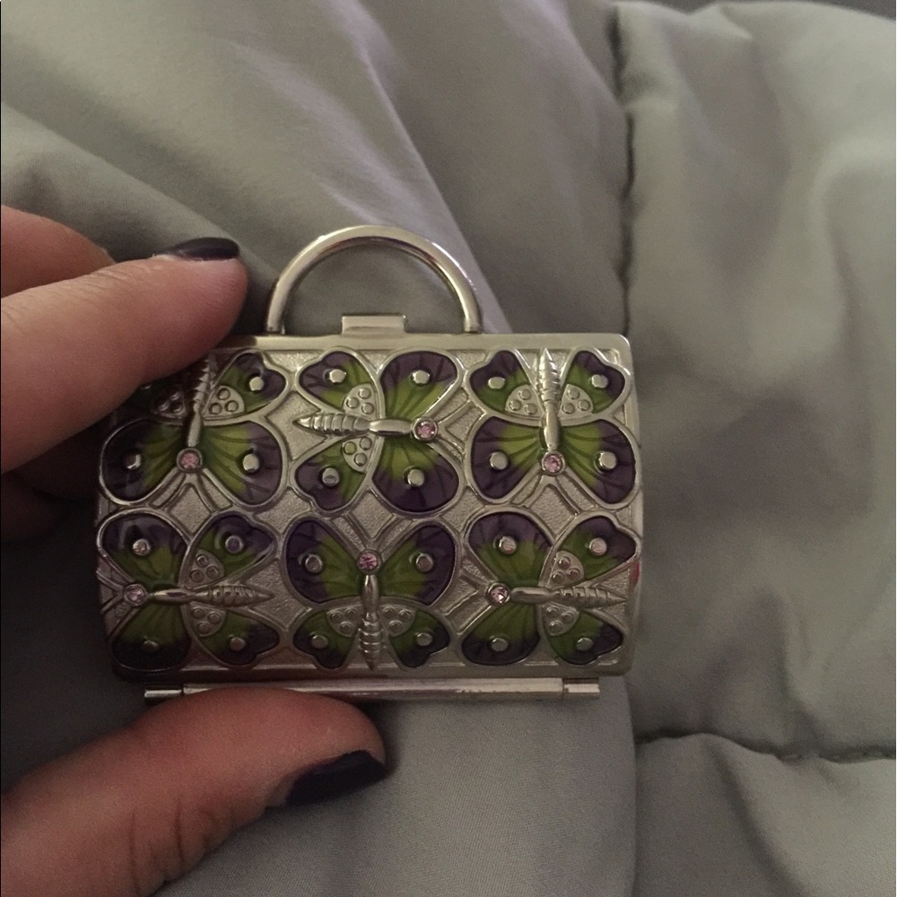 Judith Leiber mini pill case.