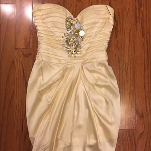 Bebe cream colored strapless dress